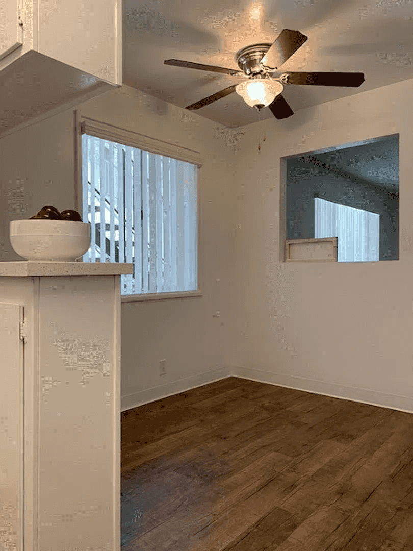 renovated dining area with designer ceiling fan