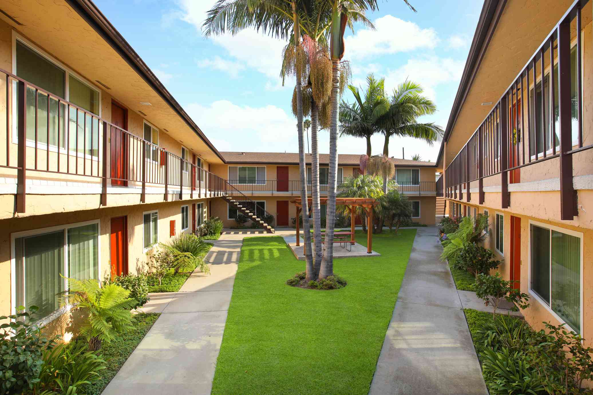 community courtyard with tropical palm trees
