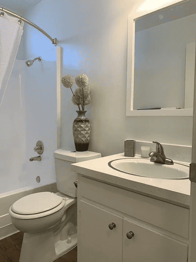 modern bathroom interior with white cabinetry
